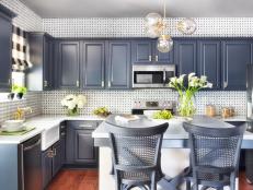 Updated Kitchen With Neutral Gray Cabinets and Cherry Wood Floors