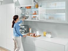 Hardware manufacturers like Blum are changing the way cabinet doors and drawers function. These hydraulic, easy-close doors fold up and out of the way with the touch of a button.