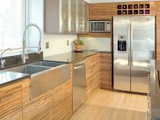 Contemporary Kitchen With Bamboo Cabinets and Stainless Steel Countertops