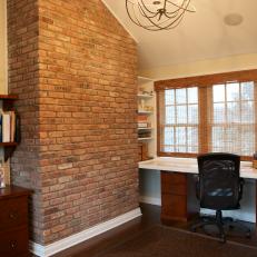 A Neutral Home Office with a Brick Wall