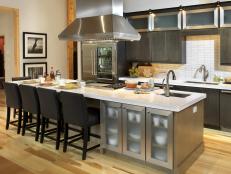 High End Kitchen With Stainless Steel Appliances and Dark Cabinets