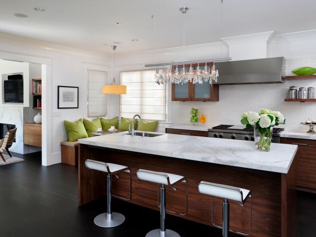 Transitional Kitchen With Marble Countertops and Dark Wood Floors