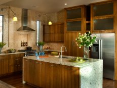 Kitchen With Hickory Cabinets and Stone Backsplash 