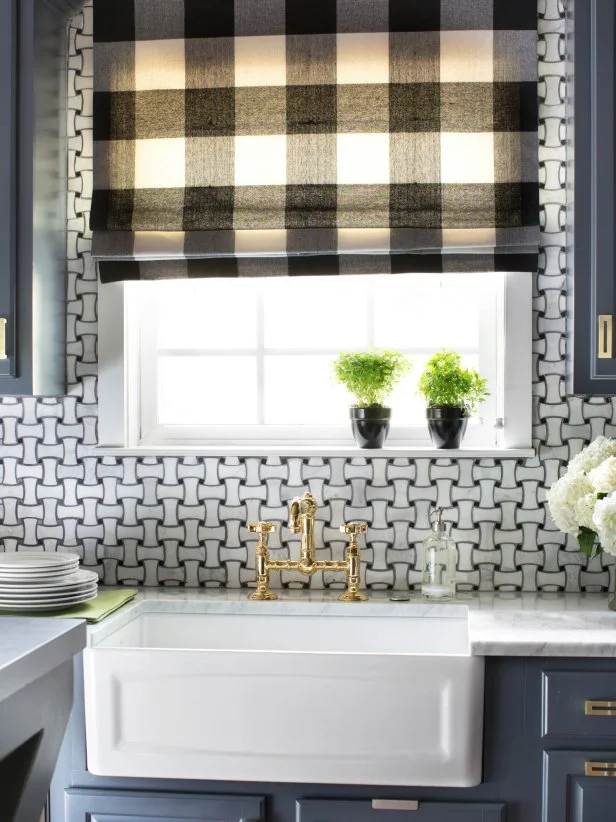 White Farmhouse Sink With Gold Faucet and Black and White Shade
