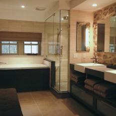 Fresh Master Bathroom With Stone Wall