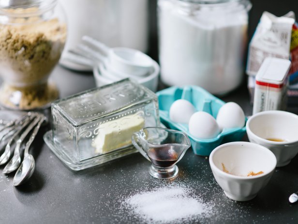 Baking Ingredients Splayed on Black Countertop 