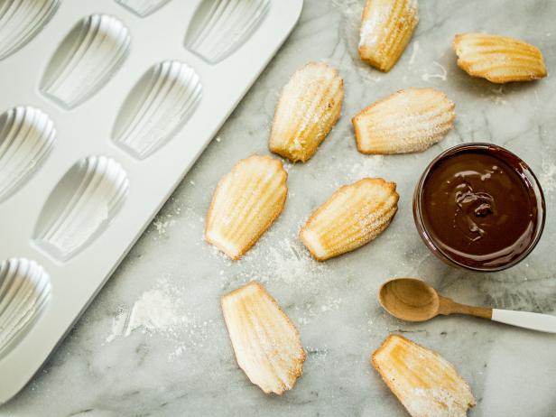 Cookies and Sugar on Countertop With Melted Chocolate