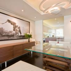 Contemporary White Dining Room With Walnut Sideboard