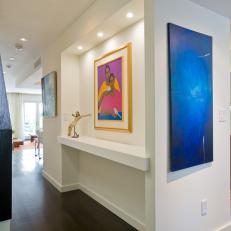 Modern White Hallway With Colorful Artwork