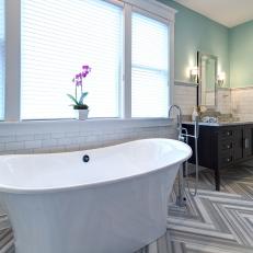 Luxurious Bathroom With Herringbone-Patterned Floor