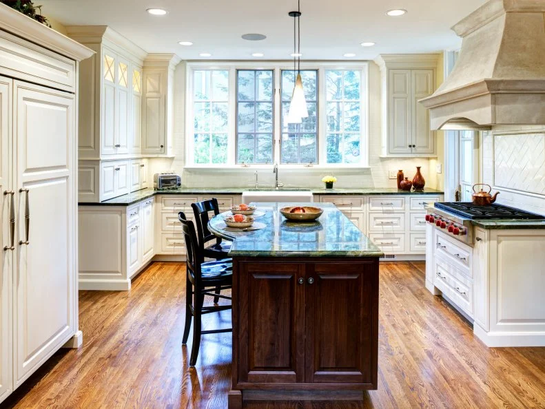 White Kitchen With Green Marble Countertops and Walnut Island Traditional White Kitchen With Walnut Island and Marble Countertops