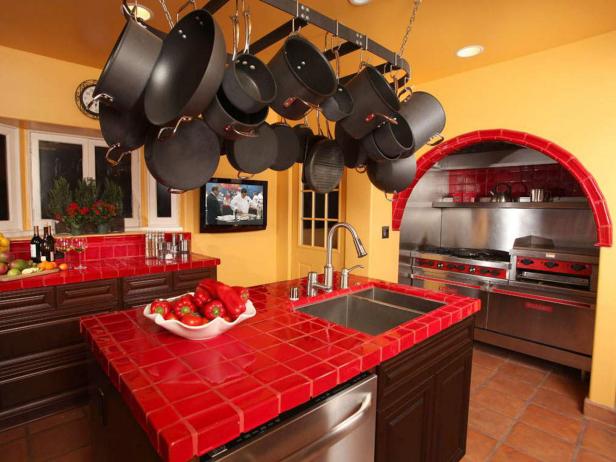 Kitchen With Yellow Walls and Red Tile