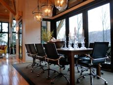 Contemporary Neutral Dining Room With Black Rolling Chairs 