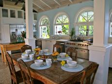 Blue and White Cottage Kitchen with Arched Windows