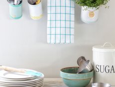 Kitchen Utensil Storage Using a Towel Rack, Soup Cans and Hooks