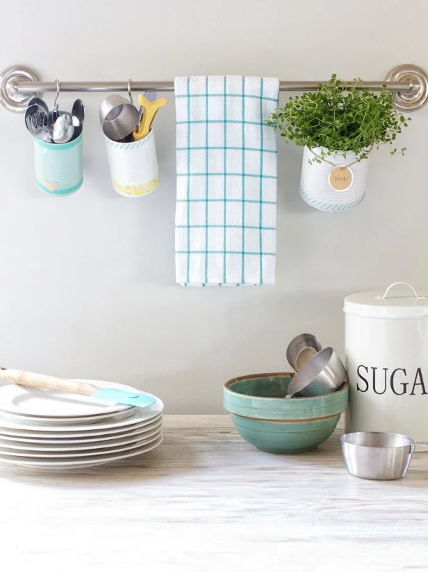 Kitchen Utensil Storage Using a Towel Rack, Soup Cans and Hooks