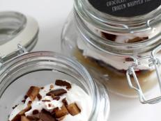 Nothing is better than layers of caramel and chocolate-covered toffee chunks mixed in with whipped topping and chocolate cake, all packaged nice and neat in your own personal jar.