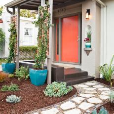 Home Exterior With Orange Front Door