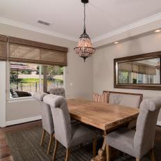 Neutral Transitional Dining Room With Patio View