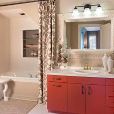 Transitional Bathroom Adds Character Through Bold Patterns and Color.