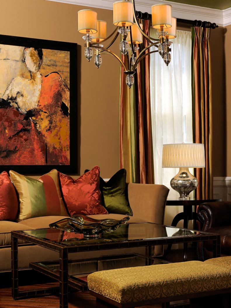 Warm Brown Living Room with Metallic Chandelier and Silk Drapes