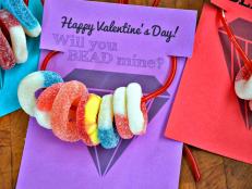 Kids will love making these fun and easy edible valentines for their friends using licorice laces and gummy ring candy.