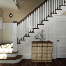 Entryway Staircase with Coastal Charm 