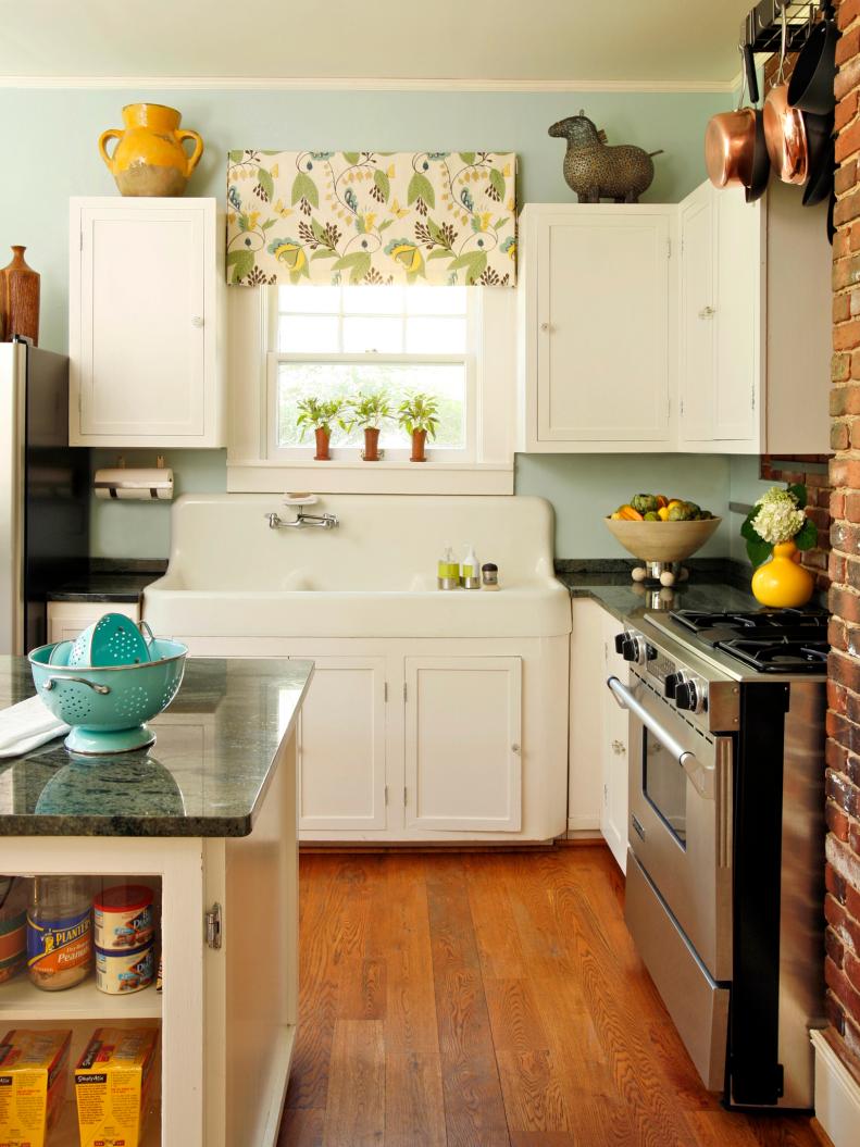 Light Blue Cottage Kitchen with Brick Wall
