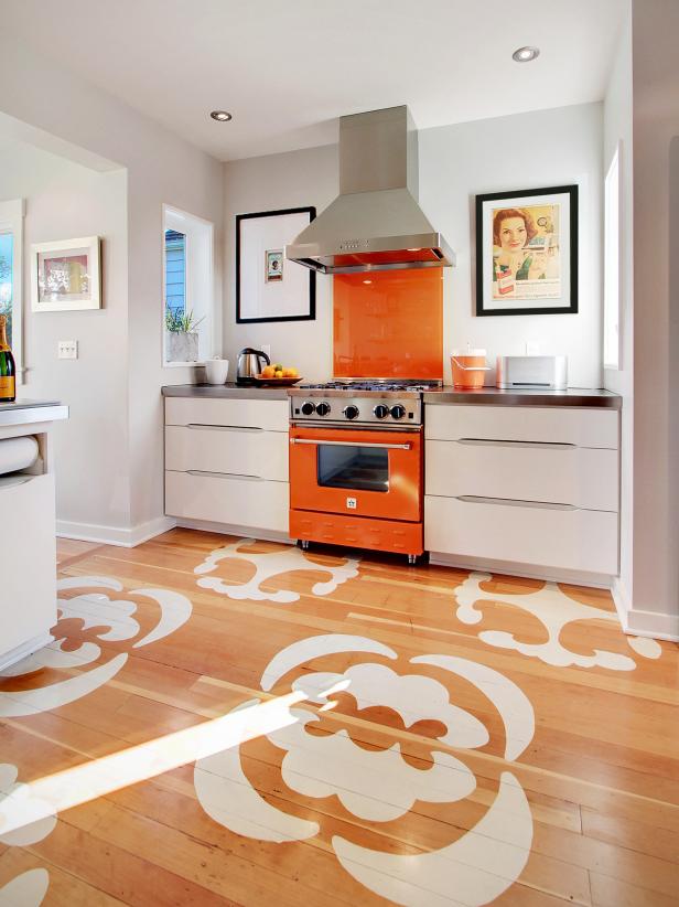 Modern Kitchen with Stenciled Hardwood Floor and Orange Appliance