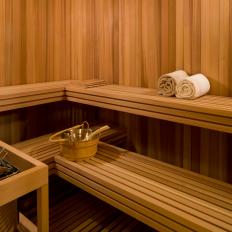 Home Sauna With Walnut Walls and Seating