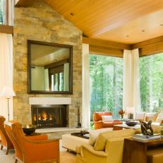 Transitional Living Room With Stone Fireplace and High Ceiling