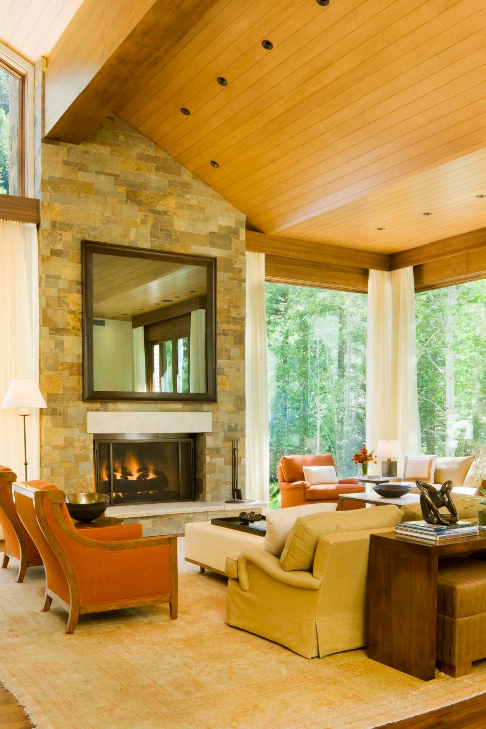 Transitional Living Room With Stone Fireplace and High ...