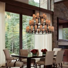 Elegant Dining Room With Walnut Table and Custom Chandelier