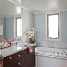 Contemporary Light Blue Bathroom With Marble Tile Detail
