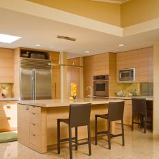 Contemporary Yellow Kitchen With Custom Cabinets