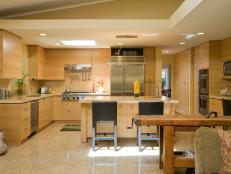 Contemporary Neutral Kitchen With Rift Oak Cabinetry and Sleek Tile Flooring 