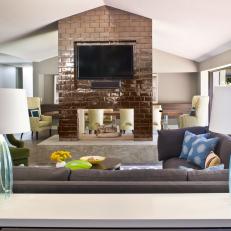 Neutral Contemporary Living Room With Metallic Fireplace  