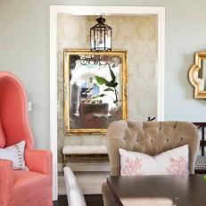 Glamorous Transitional Dining Room With Coral Hooded Chair 