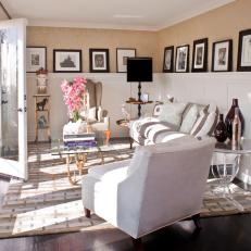 Transitional Living Space With Hollywood Regency Flair