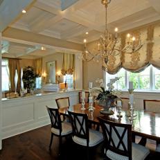 Traditional Dining Room with Chandelier and Coffered Ceiling 