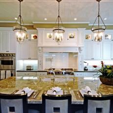 Traditional Neutral Kitchen with White Cabinets and Large Marble Island 