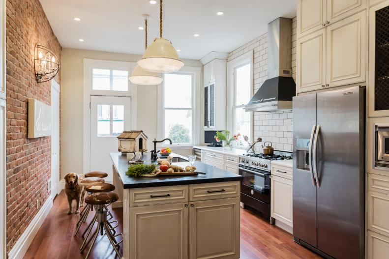 White Transitional Kitchen With Subway Tile, Brick and Calcutta Marble