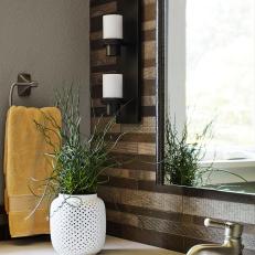 Tiered Sconce and Rustic Textured Backsplash 