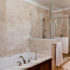 Transitional Bathroom With Calcutta Marble Backsplash