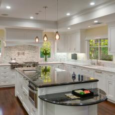 Black Granite Countertop is Bold Contrast in White Kitchen