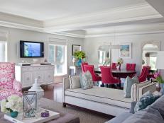 White Living and Dining Area With Raspberry Accents