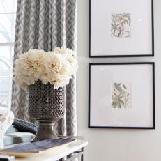 Subtle Gray and White Art in Transitional Living Room