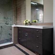 Contemporary Beige Bathroom With Sleek Brown Vanity
