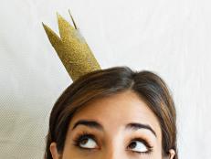 Make a miniature gold glitter crown for a fun and easy New Year's Eve photo booth prop.