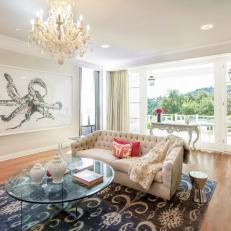 Transitional Living Room With Chandelier and Sea Creature Art